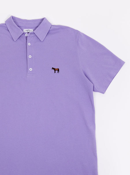 Flat lay of men's lilac polo shirt in 100% cotton with Newmarket 875 horse logo embroidered on the front.